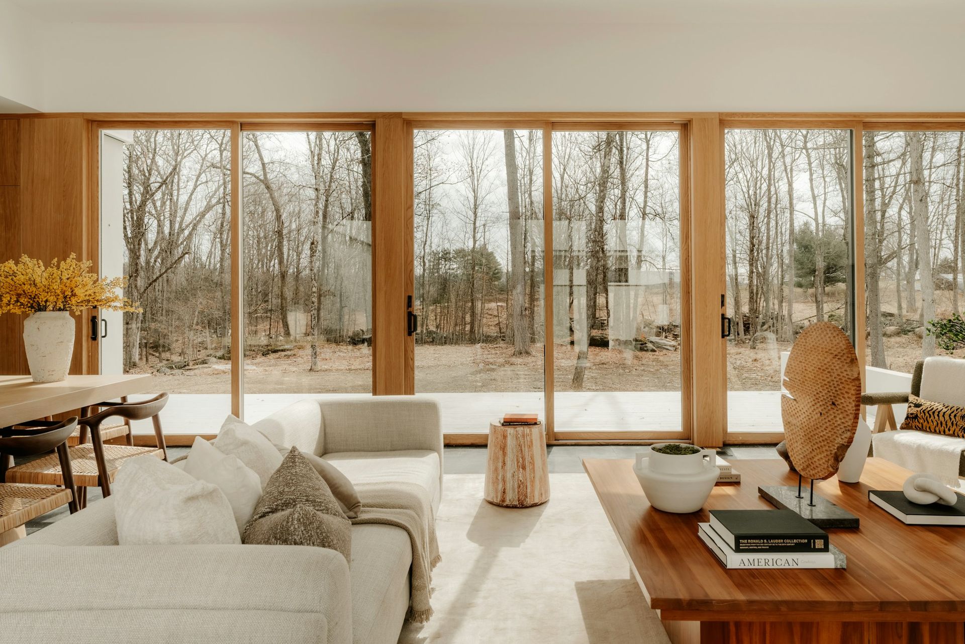 A light-filled living room with thoughtfully integrated technology